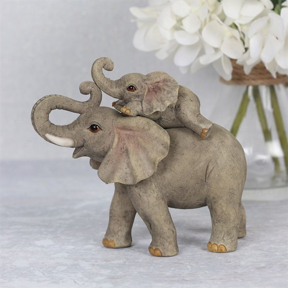 mother and baby elephant ornament, baby playing on mother's back